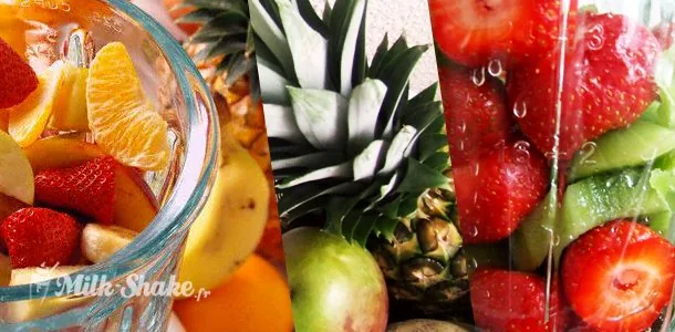 Assortiment de fruits frais, banane, fraise et mangue, prêts à être mixés